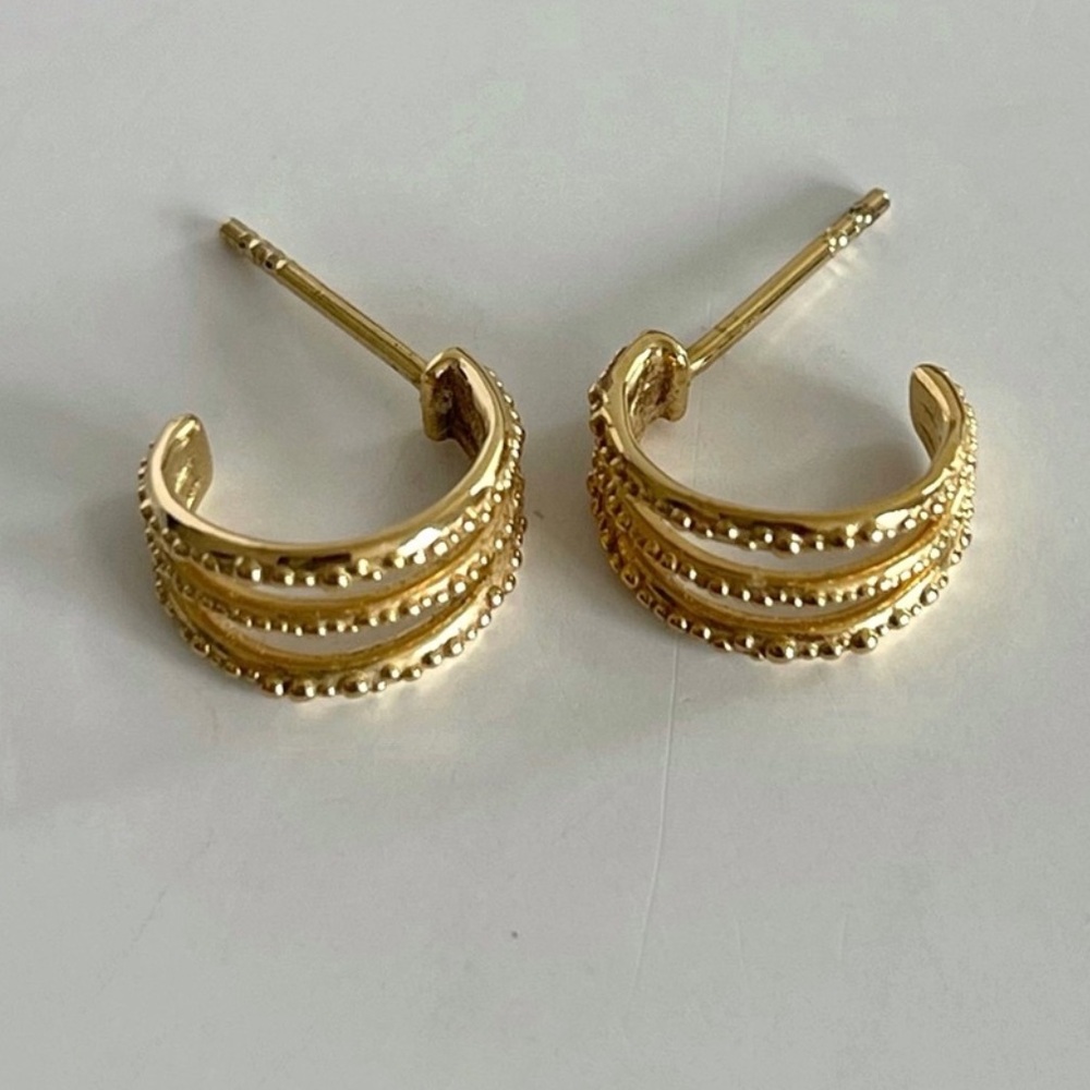 Dainty gold Daisy London triple hoop huggie earrings